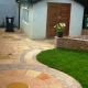 Sandstone Circle Patio with Tegula Brick Border.
 (26-02-2008)